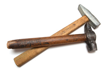 On a white background are two hammers, old and new