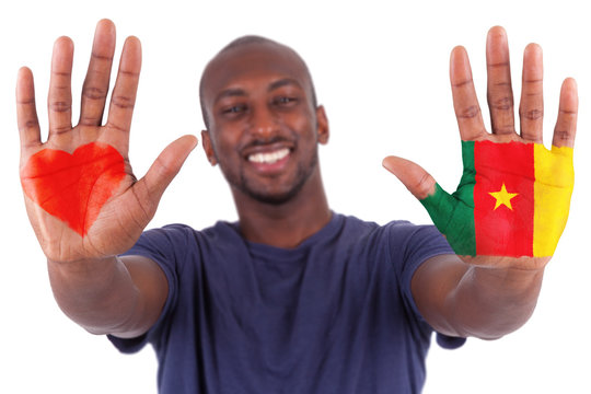 African man hands with a painted heart and cameroon flag, i love