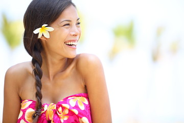 Beach woman happy looking to side laughing