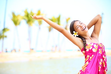 Happy people on beach travel - woman in sarong