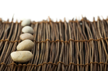 Stacked stones on wooden base