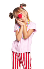 Little girl with clown nose