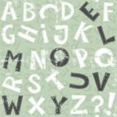 przeszyty alfabet na jasnym tle nieskończony deseń