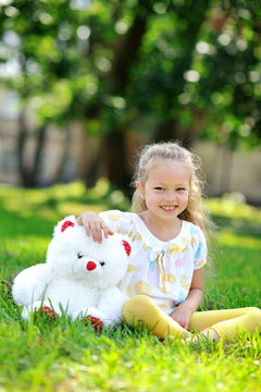 Portrait of sweet little girl outdoors
