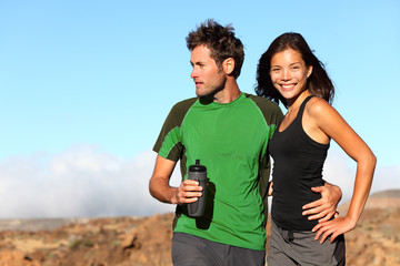 Young multicultural healthy couple in outdoor adventure
