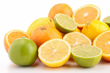 heap of orange, green and yellow lemon