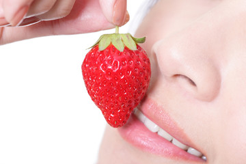 beautiful lips with strawberry