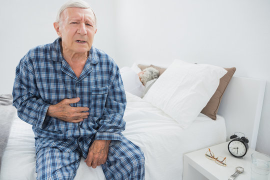 Old man suffering with body pain