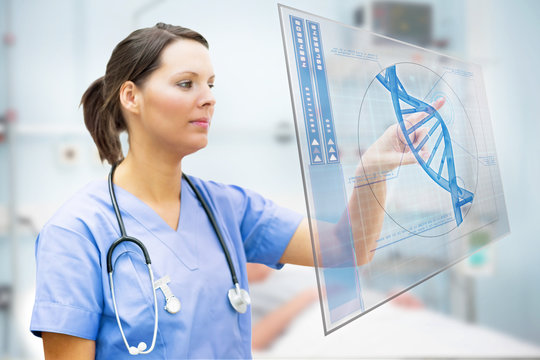 Nurse touching screen displaying blue DNA helix