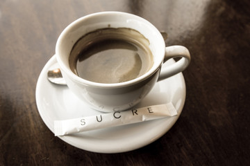 cup of hot coffee on table