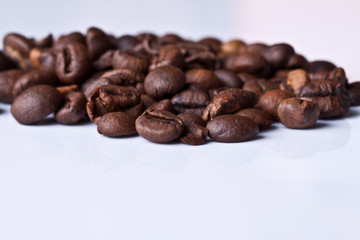 cup of coffee on a background coffee beans 