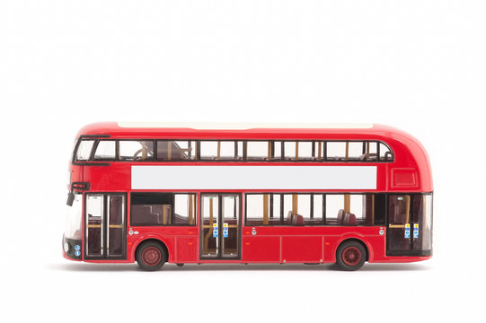 toy model red london bus on a white with copy-space