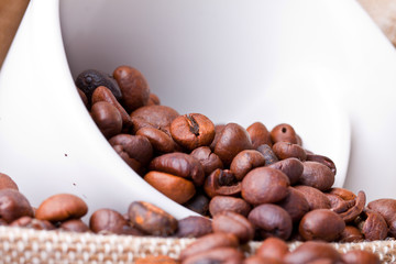 cup of coffee on a background coffee beans 