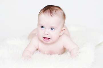 Whimsical five-months baby
