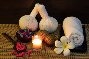 Thai spa massage setting on candlelight