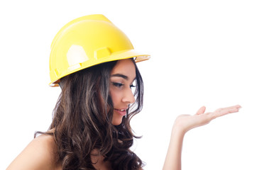 Young woman with hellow hard hat on white