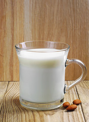 Glass cup with milk