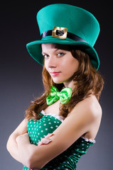 Young girl in saint patrick celebration concept