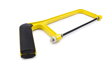 Yellow saw isolated on the white background
