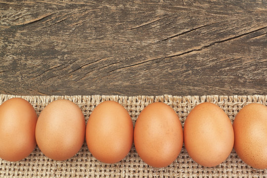 Group of Easter eggs on sackcloth, for frames and labels.