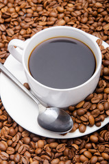 Cup of coffee and beans