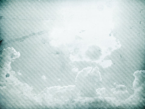 Fog and clouds on a vintage, textured paper background with a co