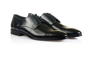 Fashion concept with male shoes on white