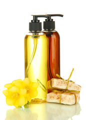 Liquid and hand-made soaps isolated on white