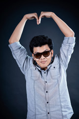 Fototapeta premium love shape hand by Handsome man