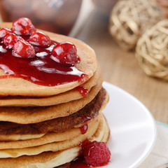 Delicious pancakes with raspberries