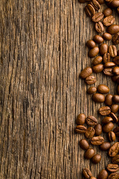 coffee beans on vintage wooden background