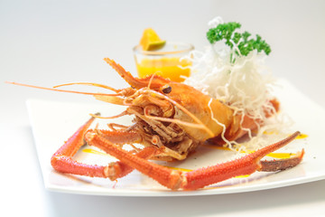 Baked crayfish on dish
