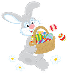 Easter Bunny with a basket of colorful painted eggs