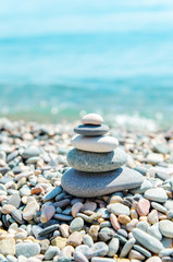 stack of zen stones near sea