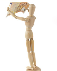 Wooden Mannequin Inspecting a Banknote