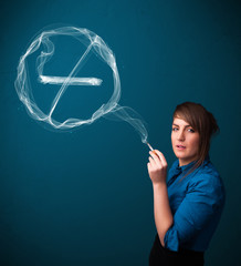 Young lady smoking unhealthy cigarette with no smoking sign