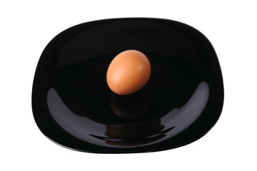 Egg on a black plate