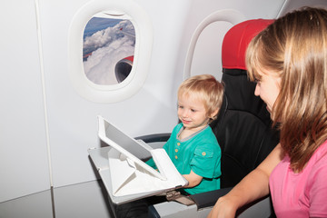 family with touch pad in flight