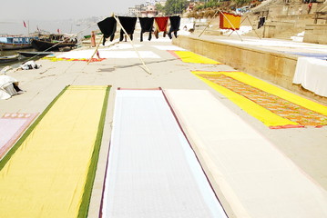 Spread out to dry sari (women's clothes) in Varanasi, India.