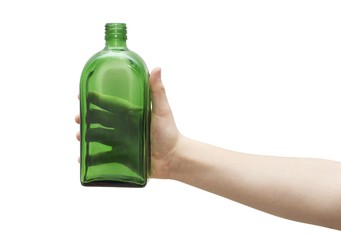 Human hand holding empty green glass bottle