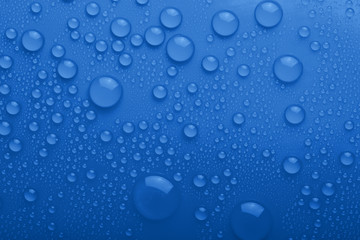 Water drops on blue background