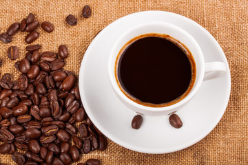 Coffee cup and beans