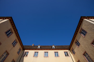 Fototapeta na wymiar old facade in blue sky