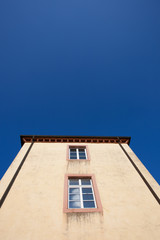old facade in blue sky