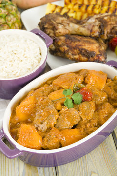 Lamb & sweet potato peanut stew, rice, jerk chicken & pineapple