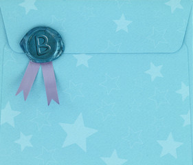 Blue envelope with sealing wax stamp