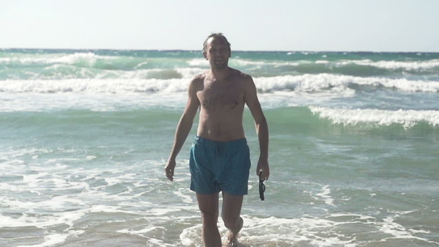 Man walking out of the sea, super slow motion, shot at 480fps