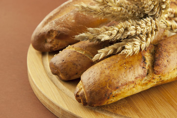 fresh baguette on a wooden board