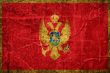 Flag of Montenegro overlaid with grunge texture