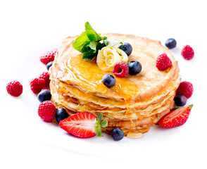 Pancake. Crepes With Berries. Pancakes stack isolated on White